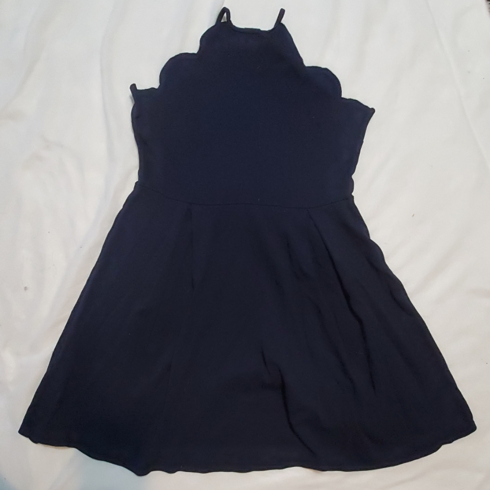 Navy blue skater dress with halter neckline and sc
